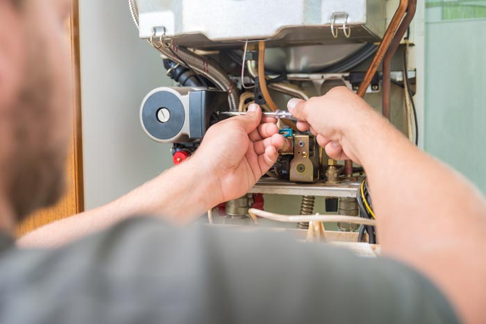 tech repairing furnace